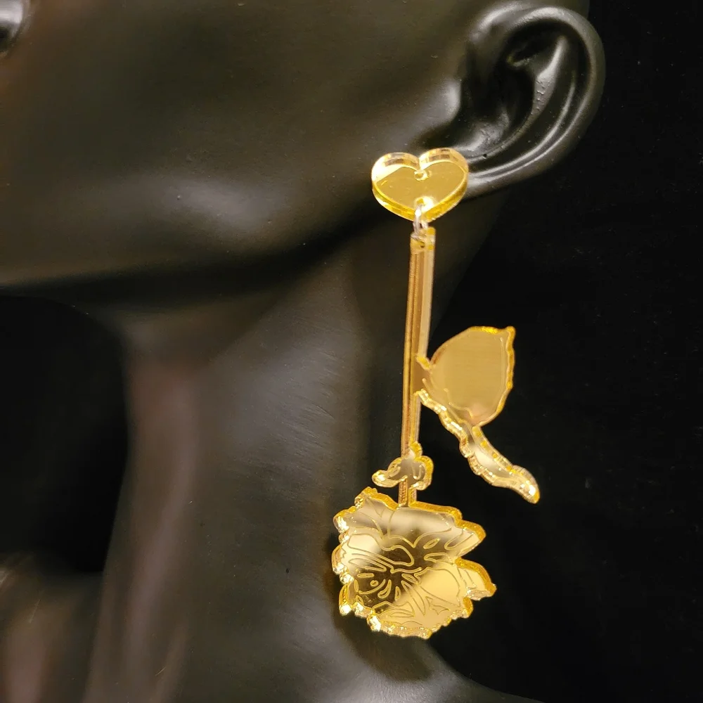 2/$20 Gold Reflective Dagger & Rose Earrings - Picture 4 of 4